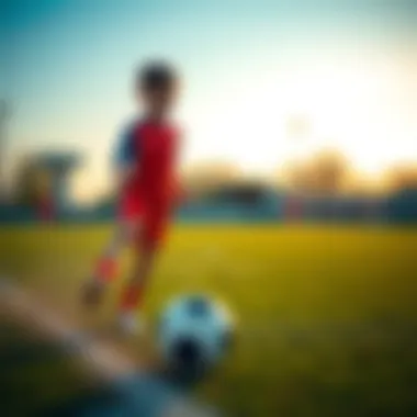 A young player practicing with a soccer ball on the field.