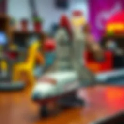 Colorful model space shuttle displayed on a table